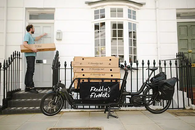 Delivery bike distribution of parcels door to door during quarantine in UK