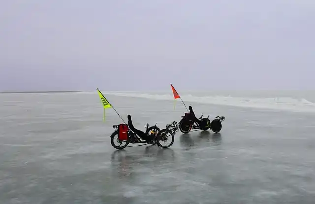 3 wheel bike sportive adventure on a frozen lake